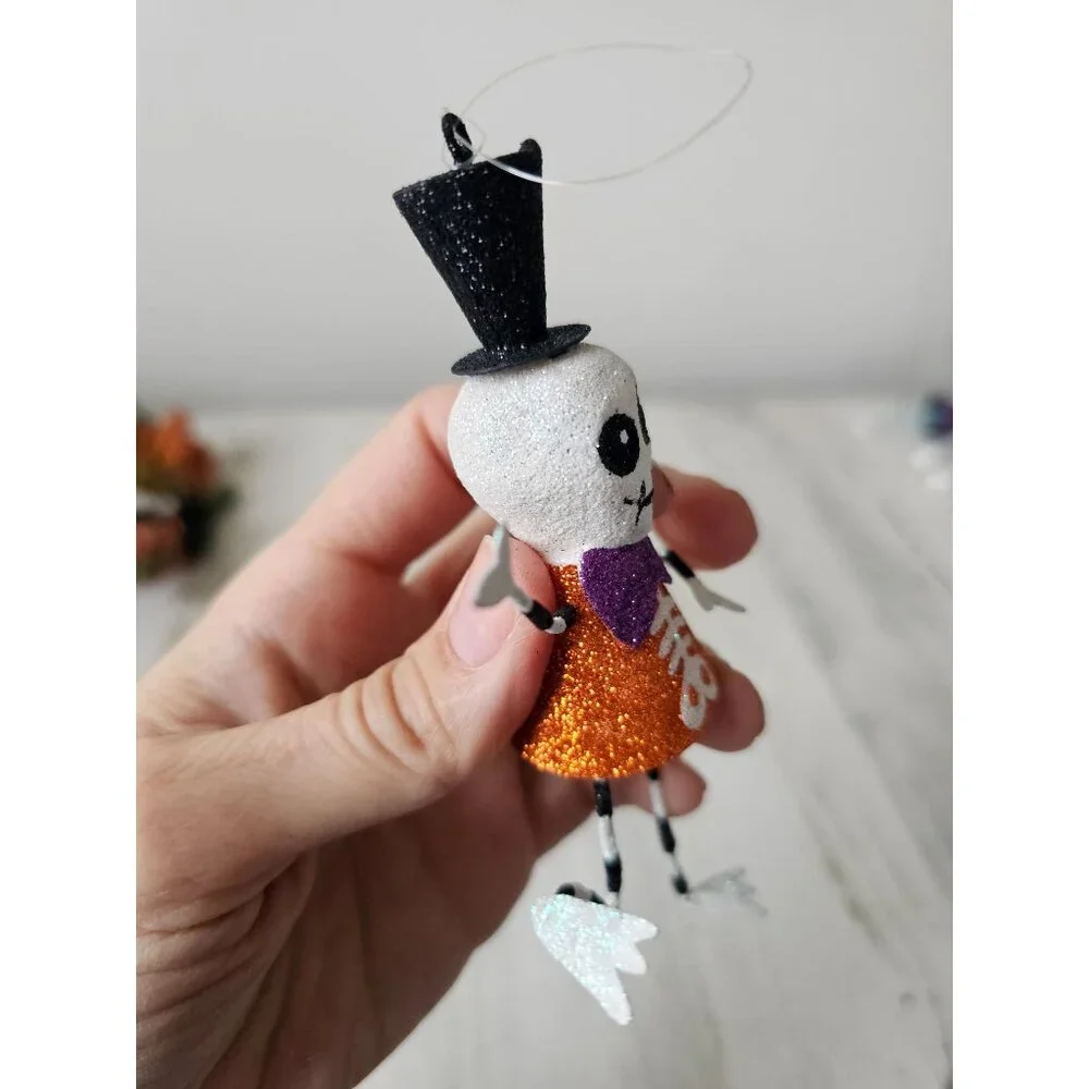 Pier 1 skeleton glitter ornament bow tie top hat Halloween Xmas tree black and w